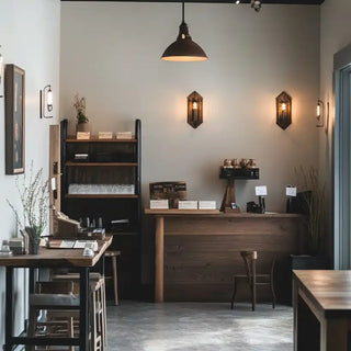 Rustic wooden counter with wall sconces and pendant lighting.