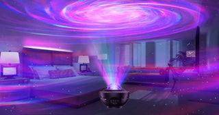 Galaxy projector creating swirling purple and pink light patterns.